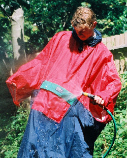 poncho blue red garden hose pipe